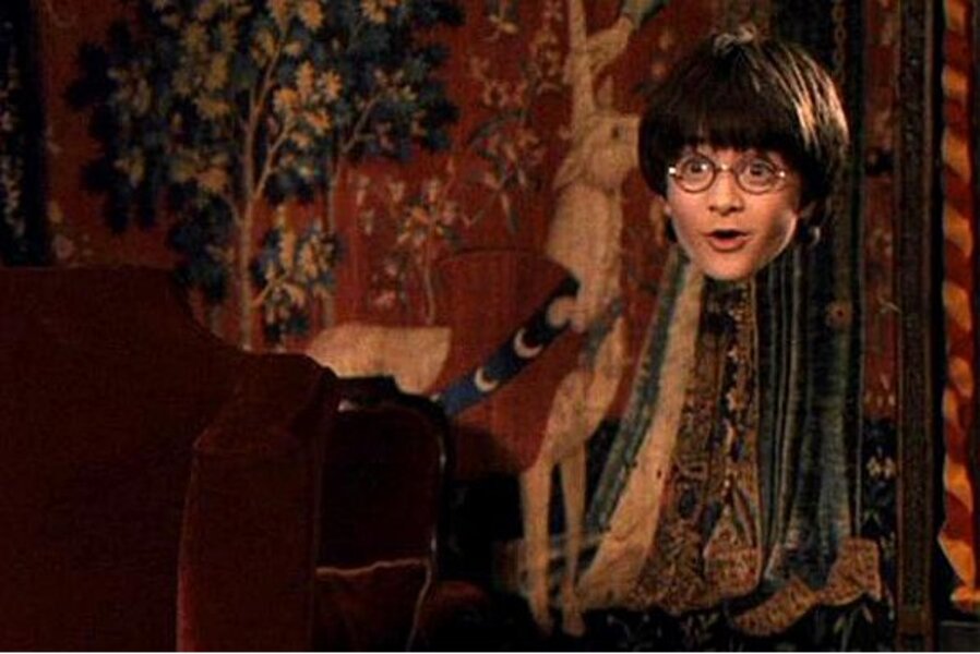 Daniel Radcliffe as Harry Potter wearing his cloak of invisibility and missing everything below the head!