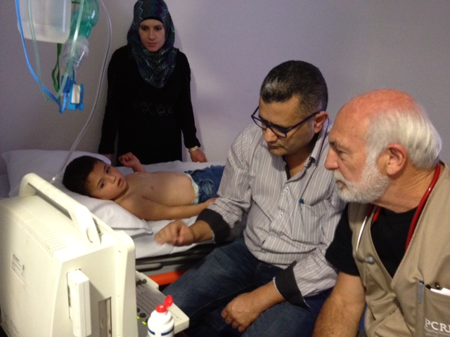 Looking at a screen during an appointment in Israel Palestine 