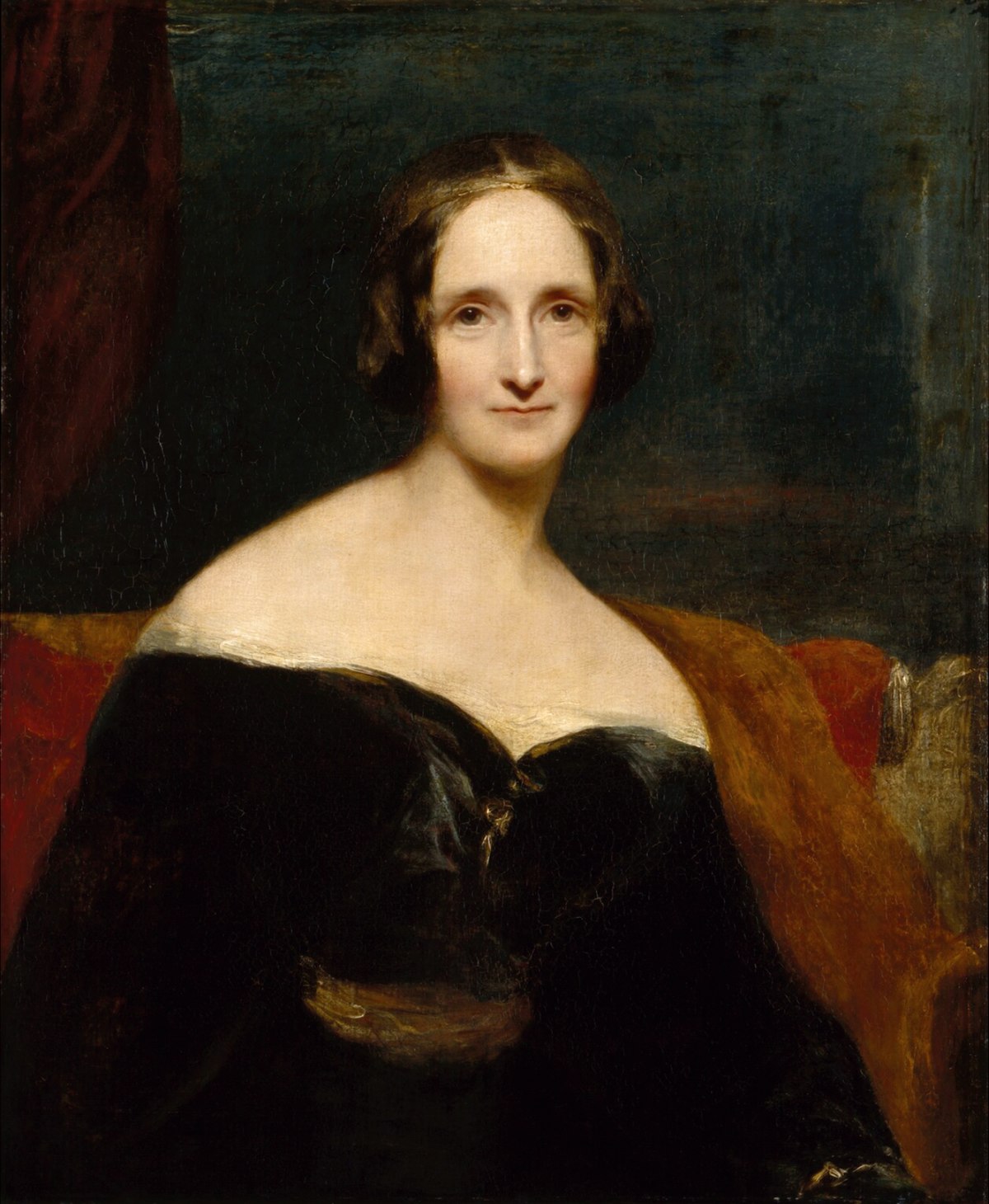 Mary Shelley, black gown, dark hair, pale skin, belt, couch, blanket
