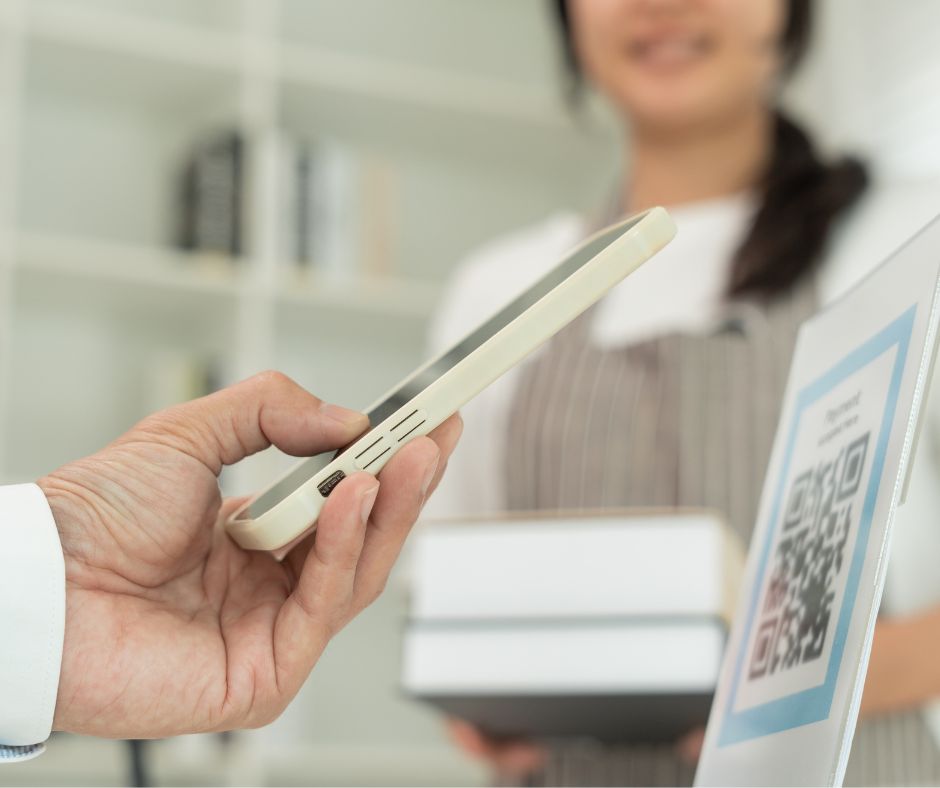 QR code, woman, books, hand, cell phone