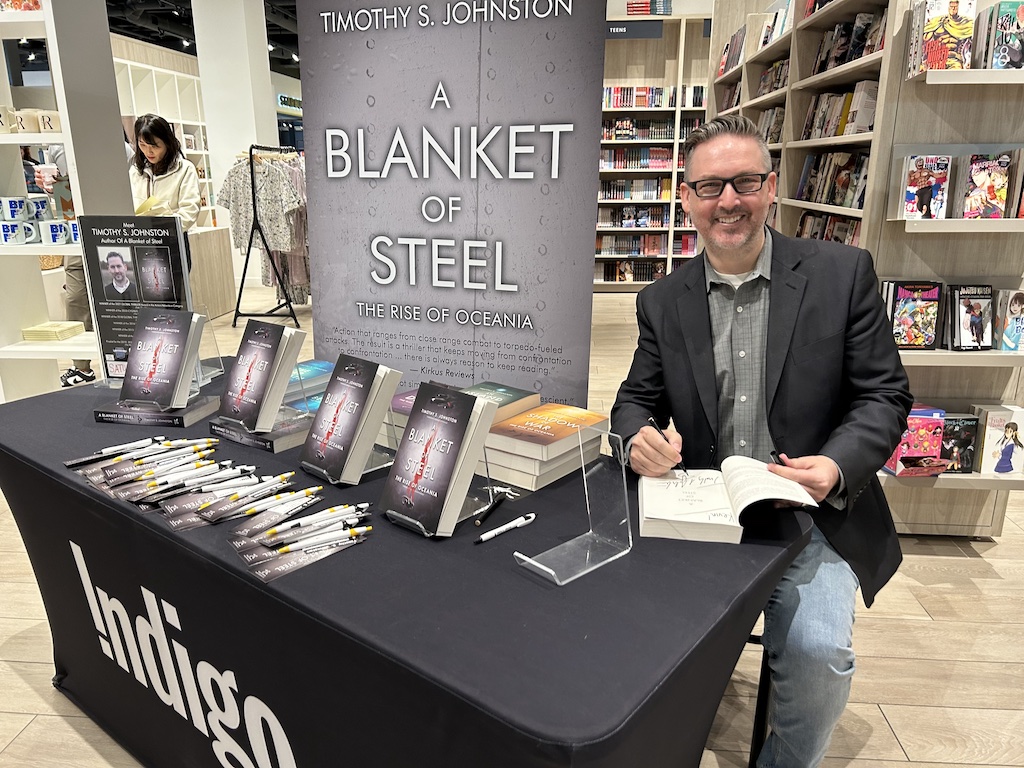 Timothy S. Johnston, books, library, signing, man, blanket of steel