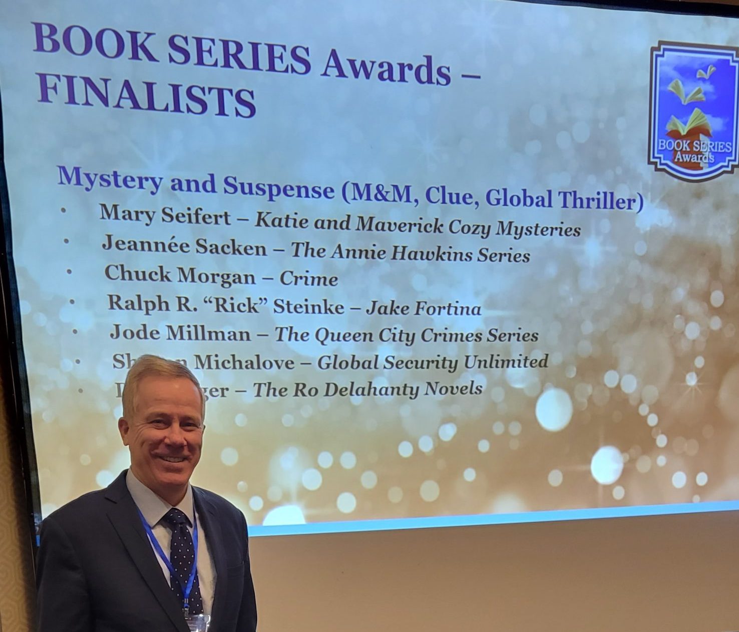 book series awards, man, conference room, big screen