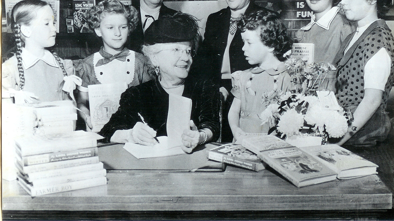 Children, elderly, author, writing, table, books