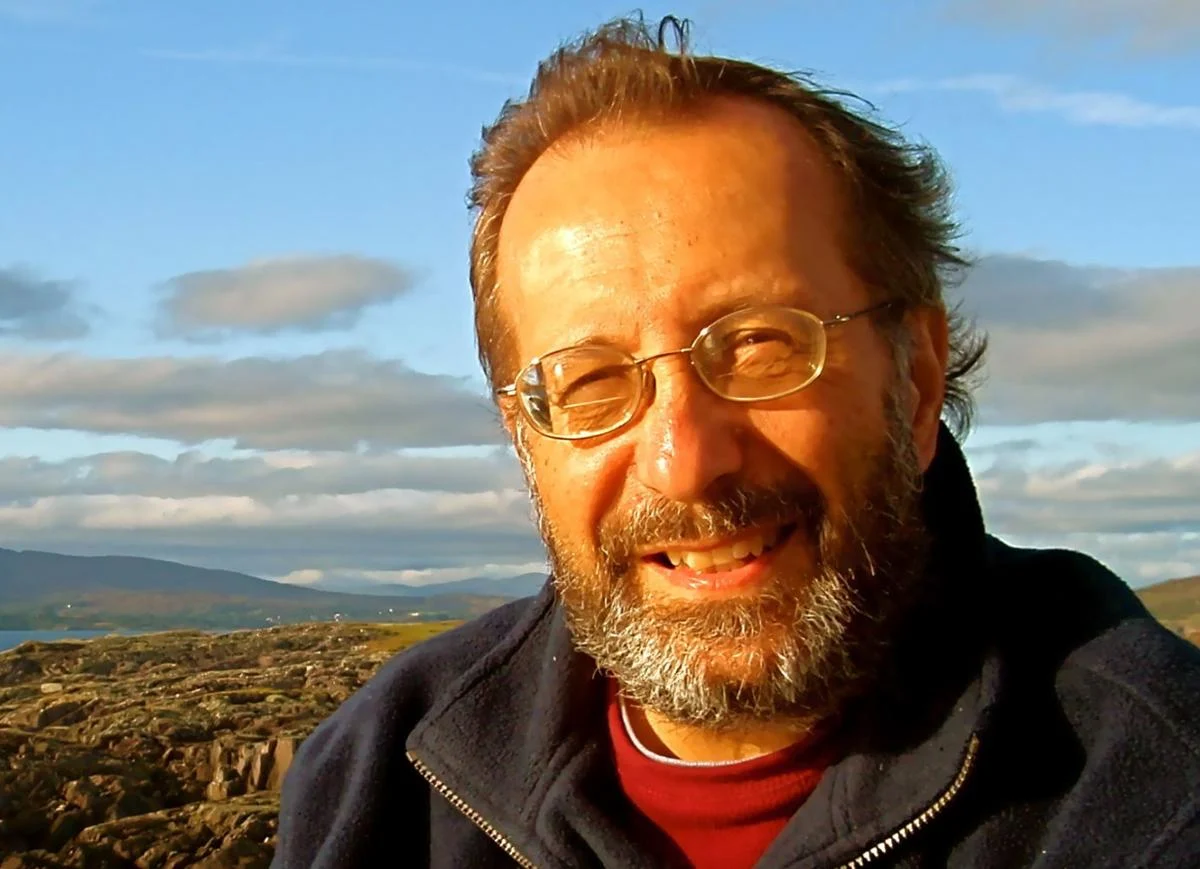 bearded man, coastline, wind