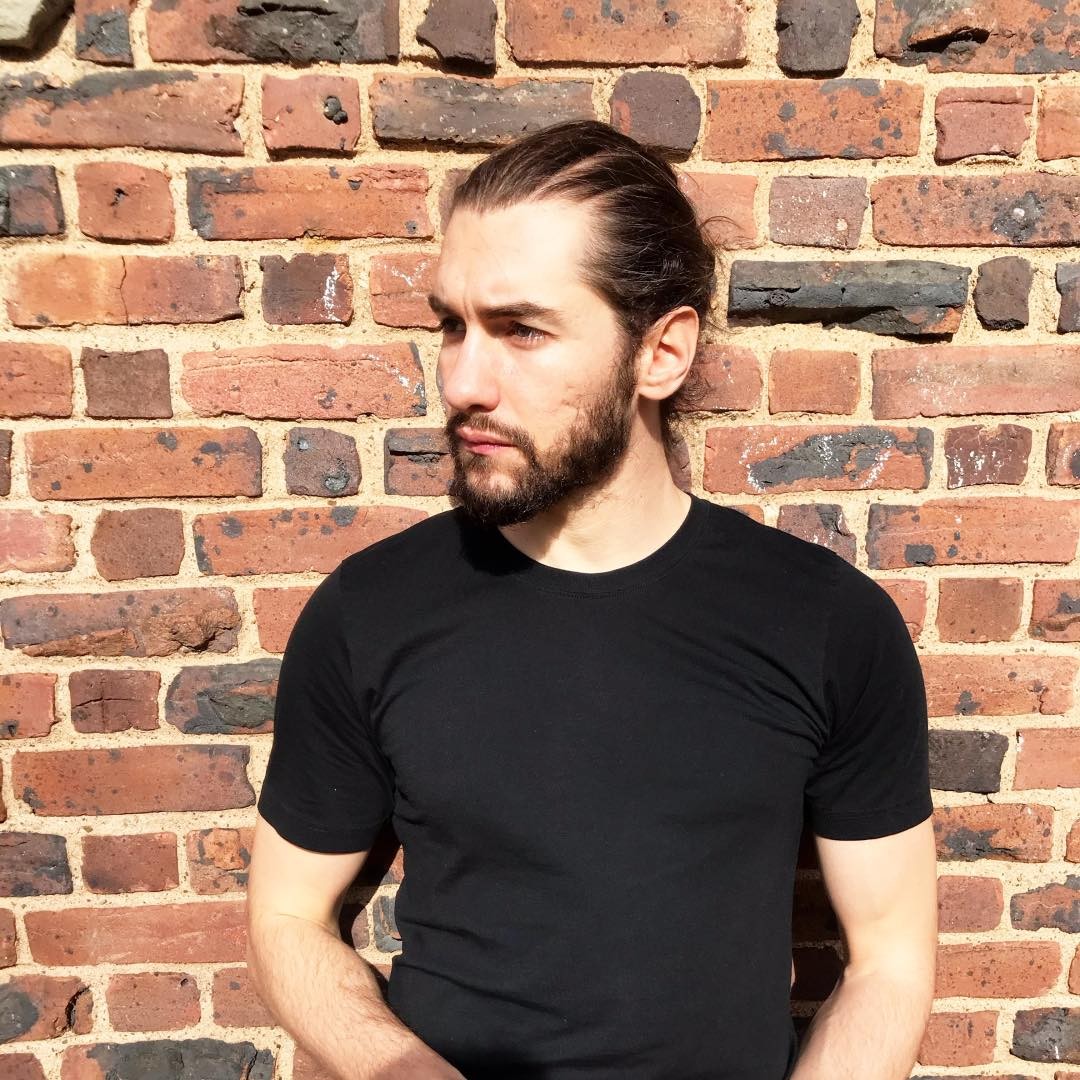Man, Black Shirt, Brick wall
