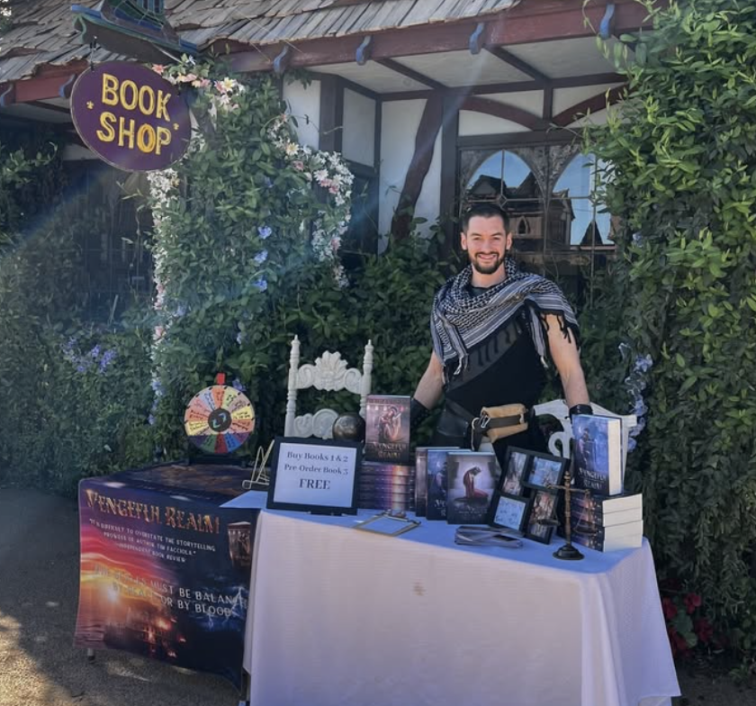 book fair, table, bushes, books, covers, man