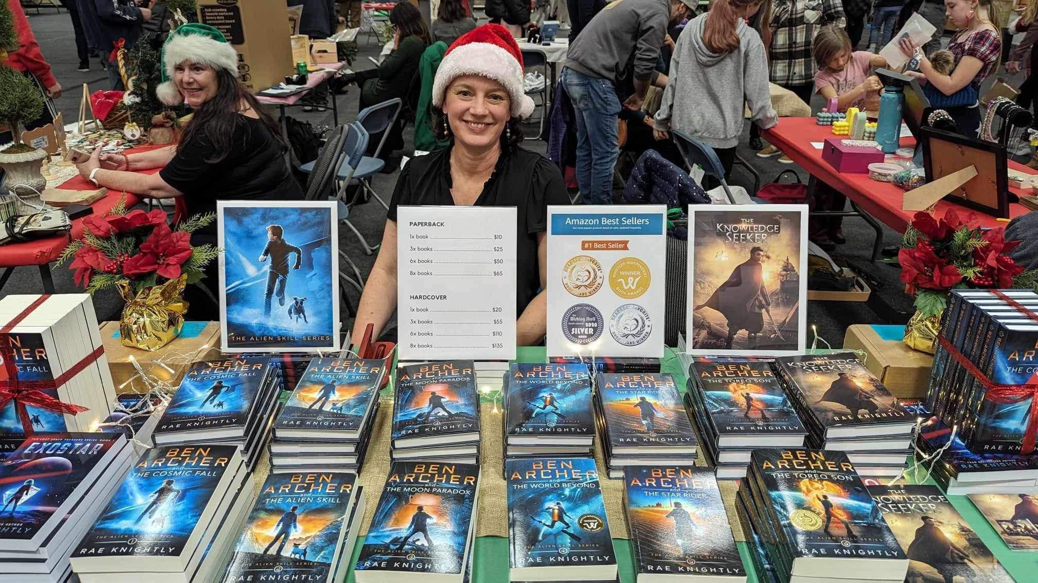 Rae KNightly, santa hat, books, people